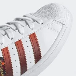 Adidas Women's Superstar X HER Studios Shoes - Cloud White / Power Berry / Gold Metallic